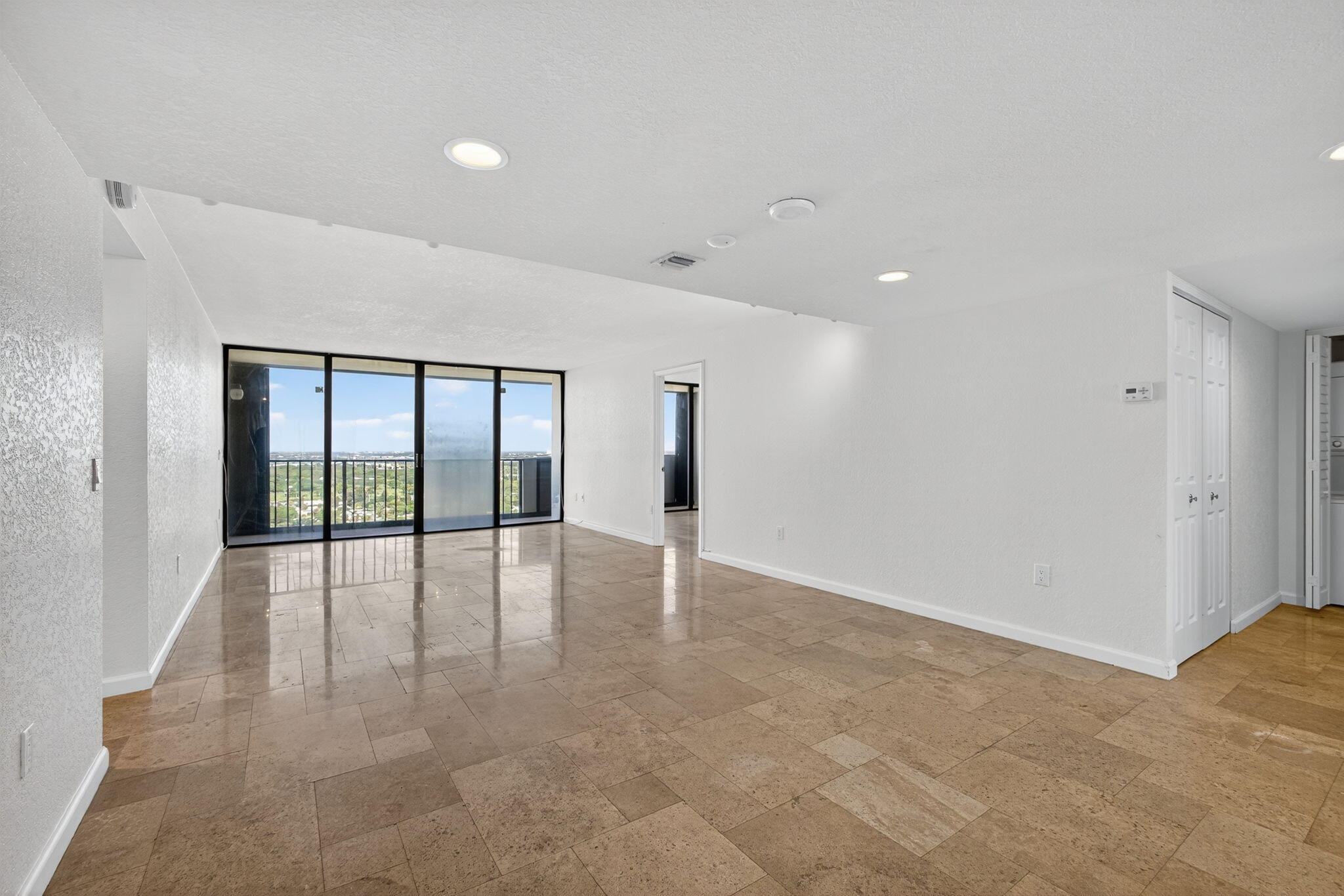 5600 North Flagler Drive, Unit 2703 West Palm Beach, FL 33407 - Photo 4 of 60 a view of an empty room with window