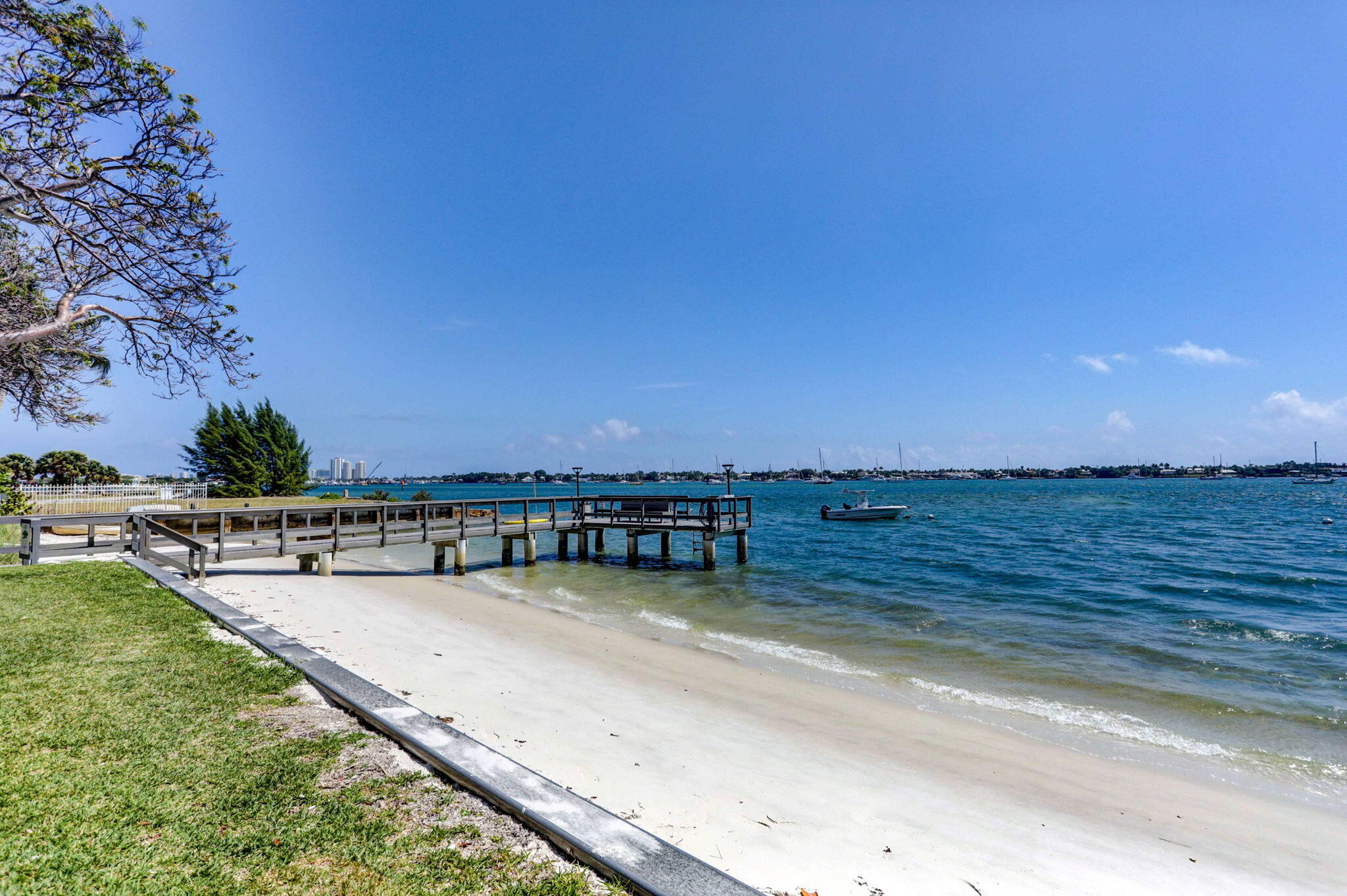 5600 North Flagler Drive, Unit 2703 West Palm Beach, FL 33407 - Photo 47 of 60 a view of a swimming pool with a terrace