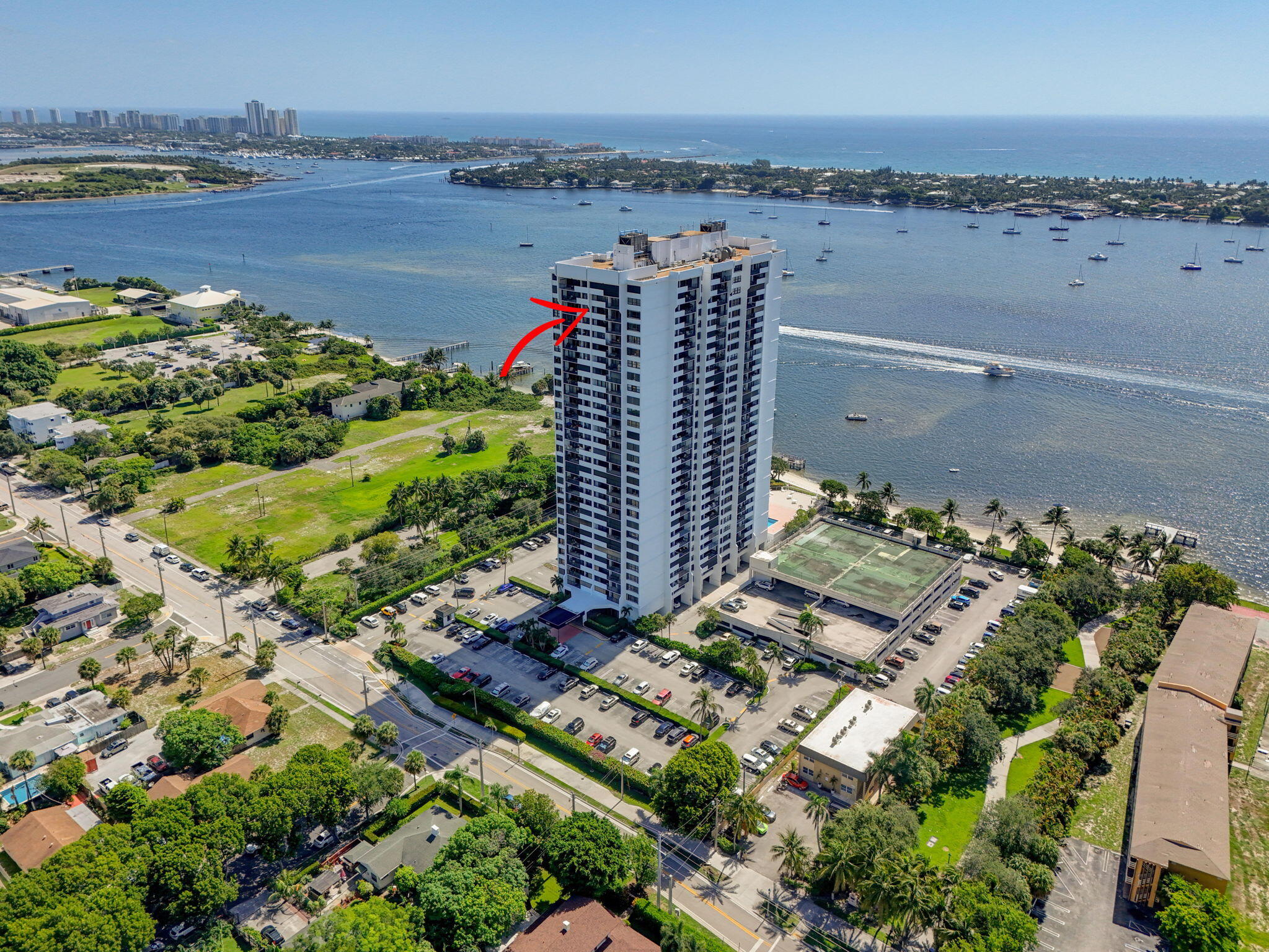 5600 North Flagler Drive, Unit 2703 West Palm Beach, FL 33407 - Photo 51 of 60 a city view with tall buildings