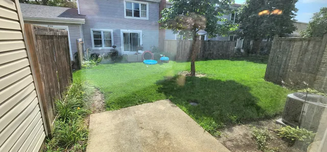 a view of a backyard with a garden