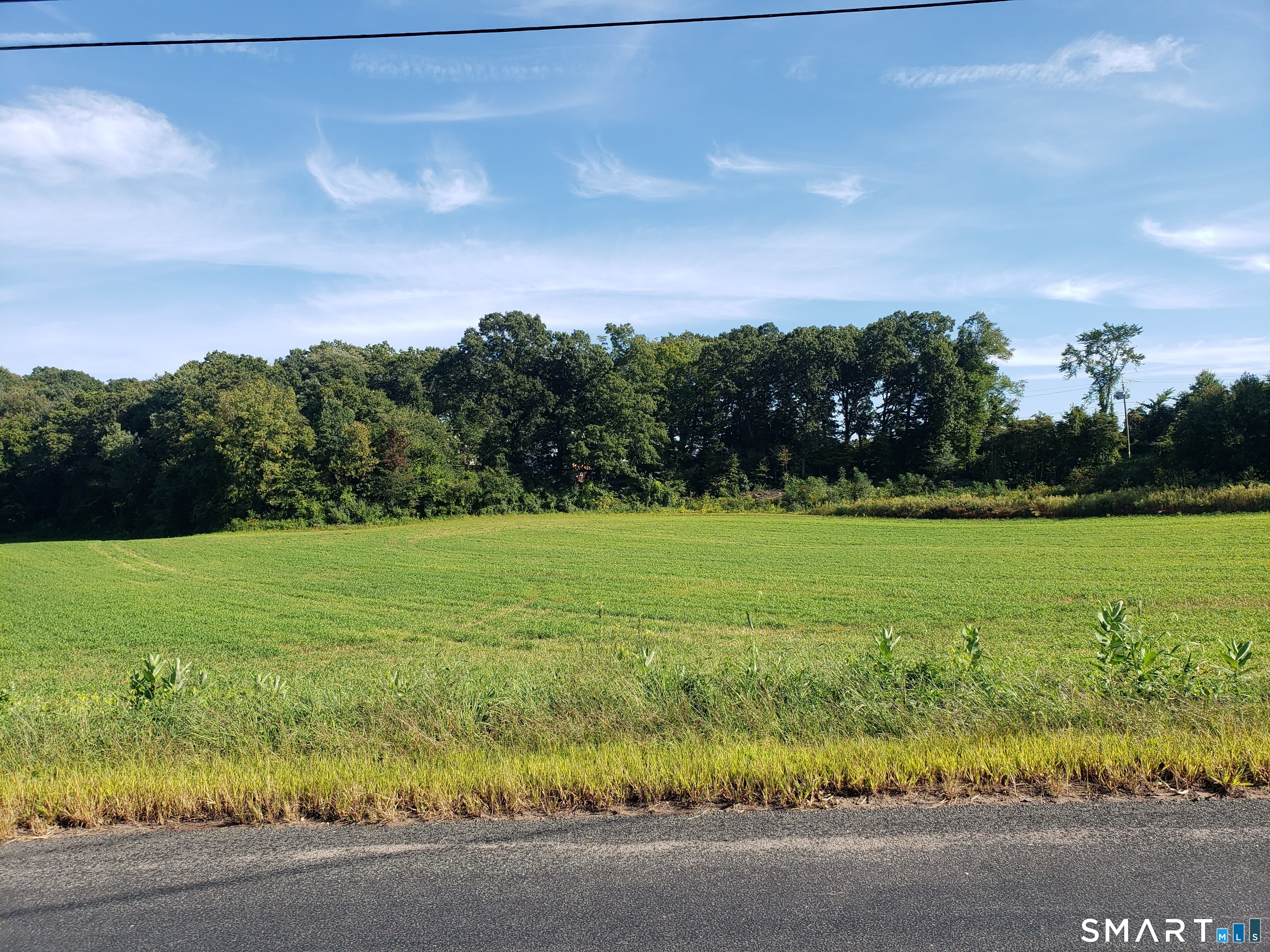 0 Chamberlain Road Broad Brook, CT 06016 - Photo 10 of 16 a view of a field with a big yard