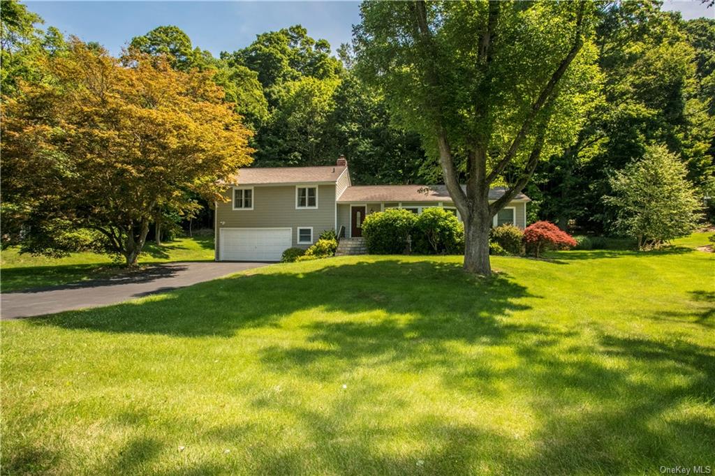 Welcome to 41 Deerfield Ln S, Pleasantville, a lovingly maintained 3-bed, 2.1-bath split level home, and set on over one acre of property, with natural gas utilities, municipal sewer & water, and Byram Hills (Armonk) schools.