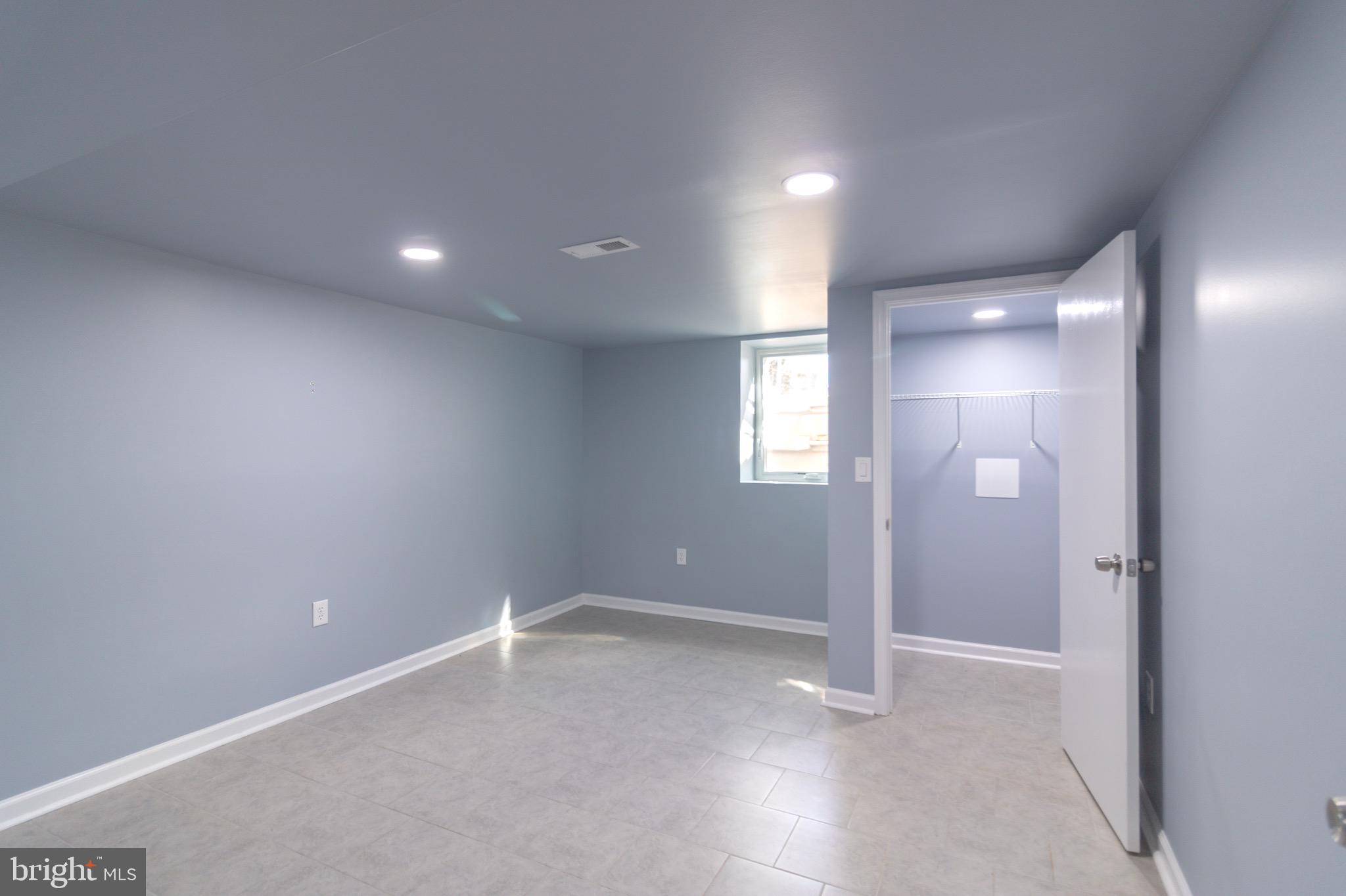 16505 Ridgeway Road Orange, VA 22960 - Photo 11 of 28 an empty room with windows and entrance