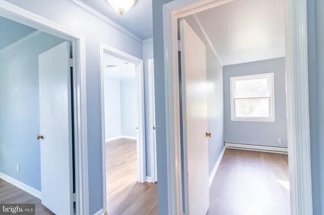 a bathroom with a sink a toilet a bathtub and shower