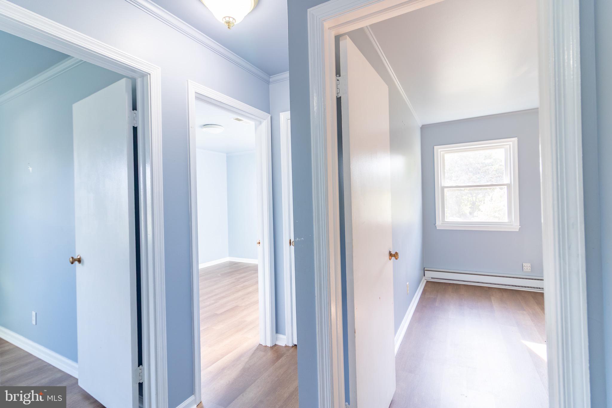 16505 Ridgeway Road Orange, VA 22960 - Photo 15 of 28 a view of a hallway with wooden floor and closet area