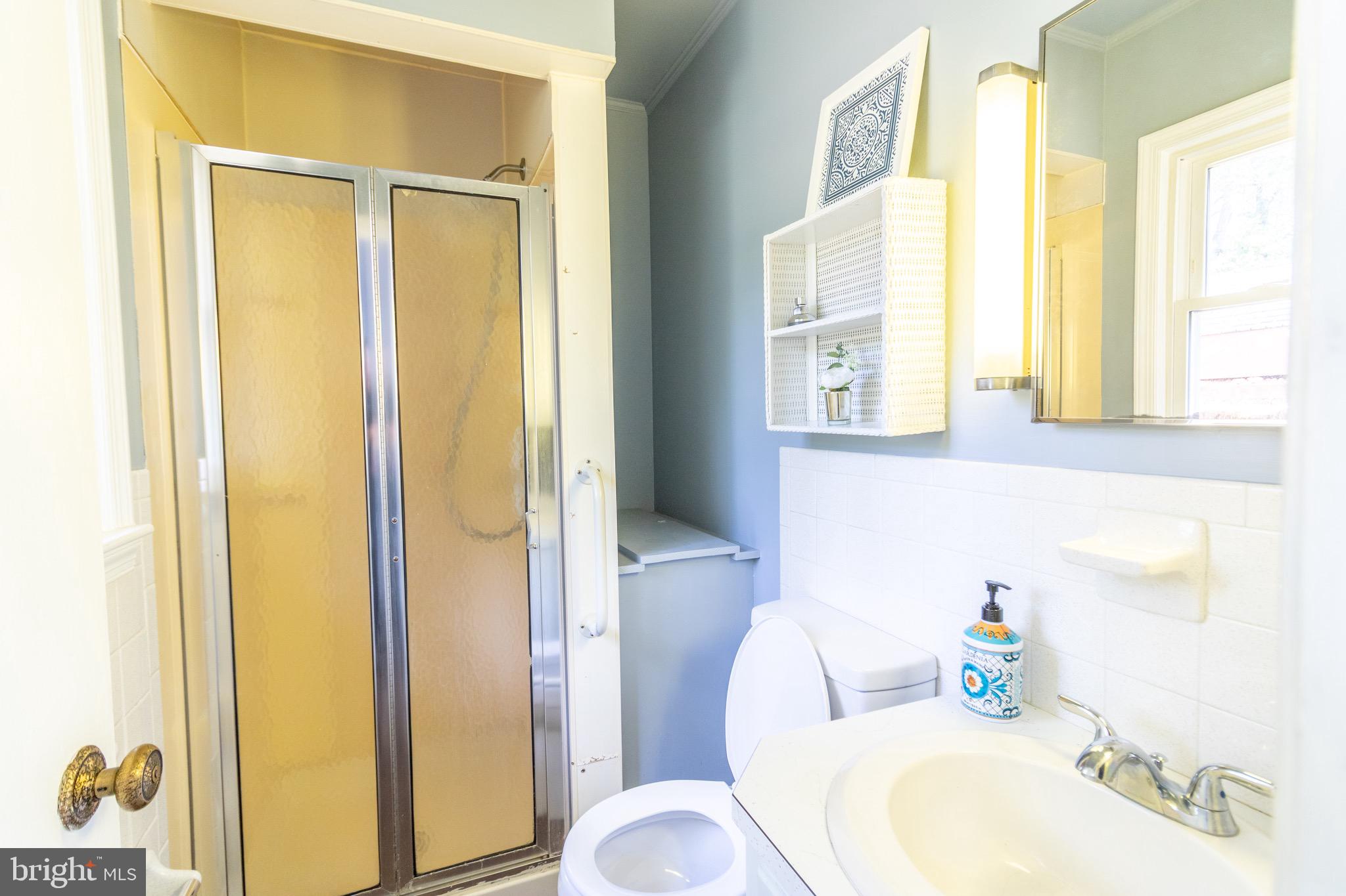 16505 Ridgeway Road Orange, VA 22960 - Photo 17 of 28 a bathroom with a sink toilet and shower