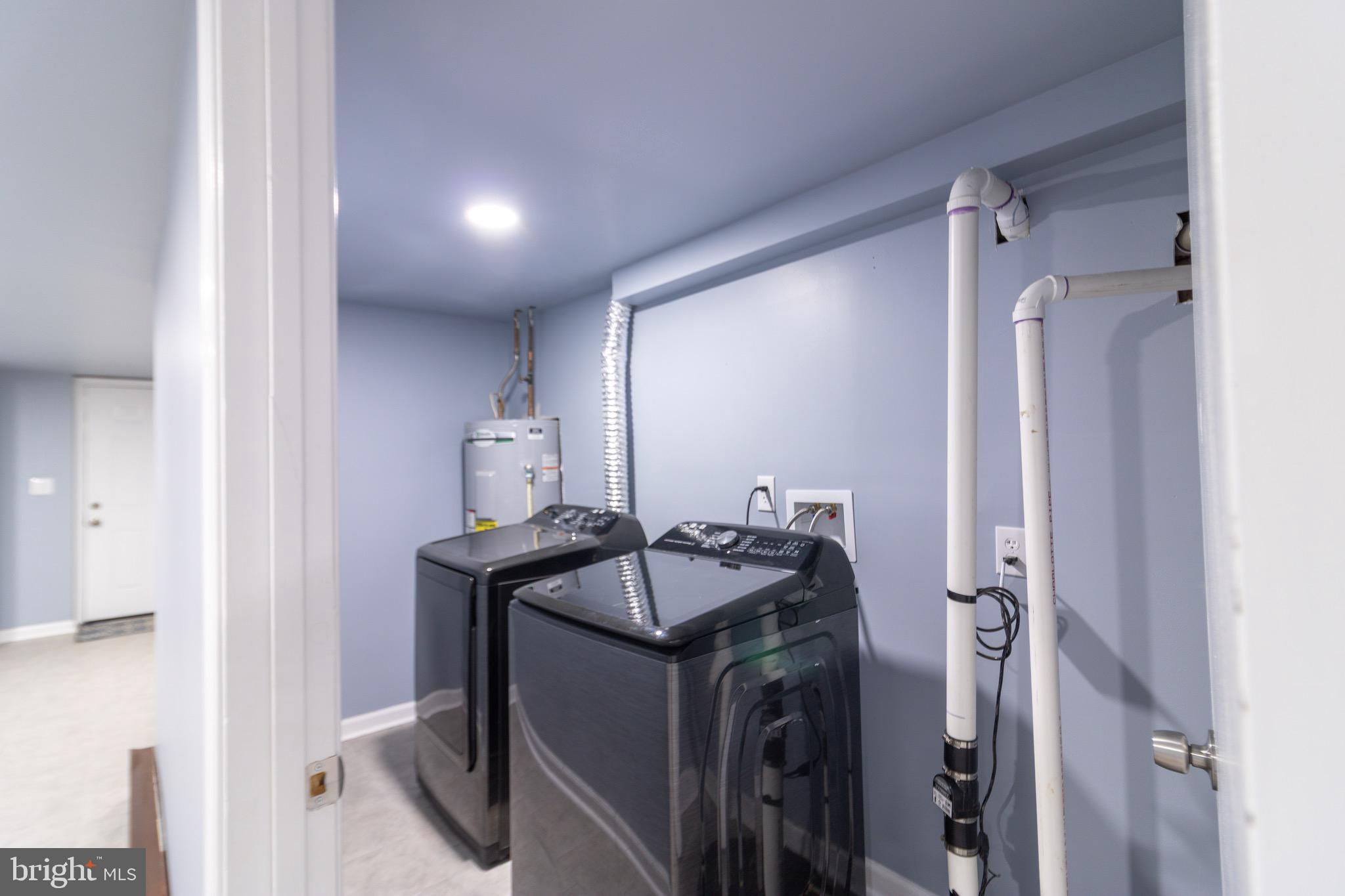 16505 Ridgeway Road Orange, VA 22960 - Photo 18 of 28 a room that has a sink and a table in it