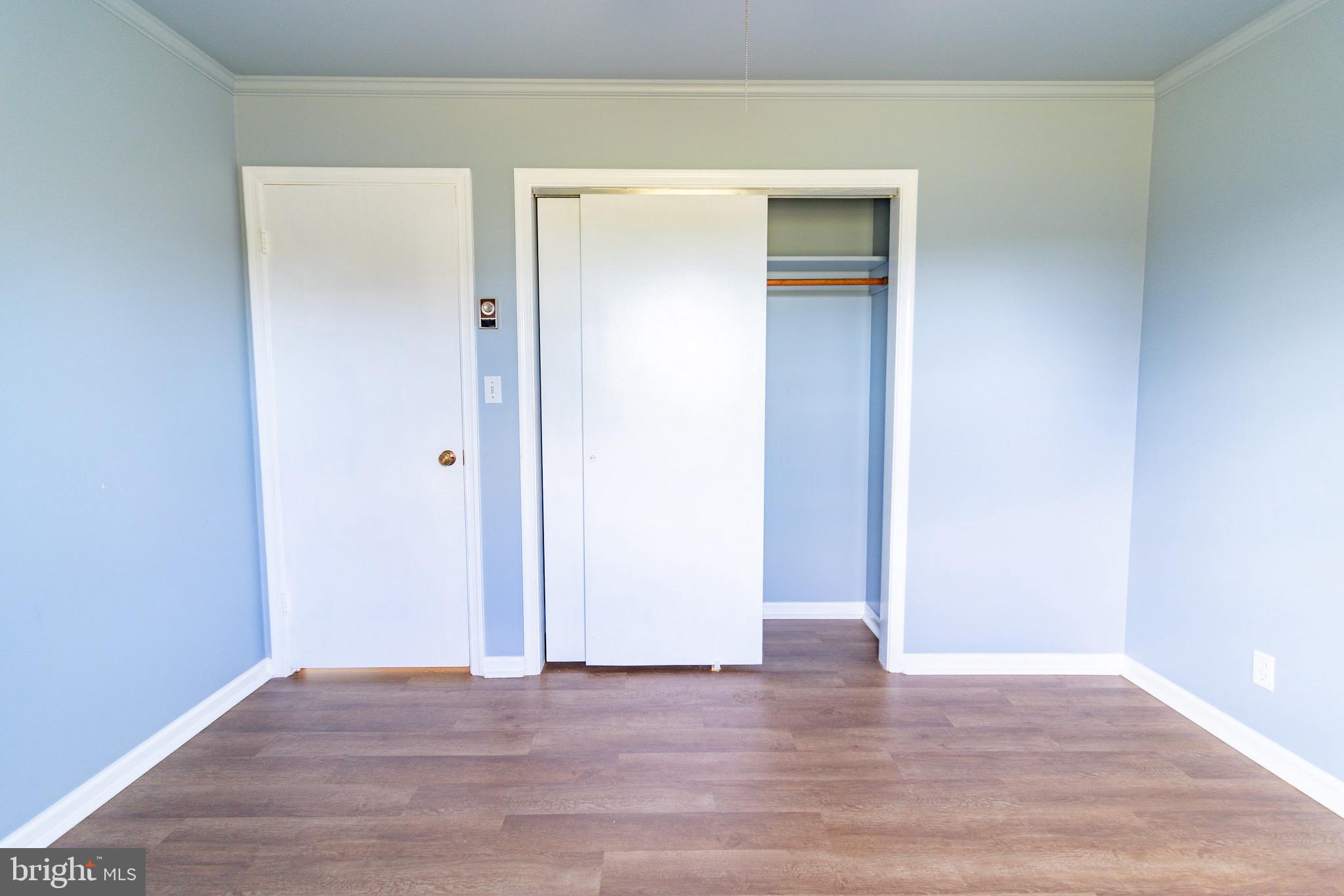 16505 Ridgeway Road Orange, VA 22960 - Photo 22 of 28 a view of an empty room with wooden floor and closet
