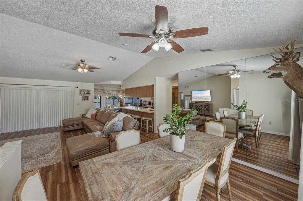 7435 Kilbride Court Weeki Wachee, FL 34613 - Photo 10 of 67 a view of a dining room with furniture