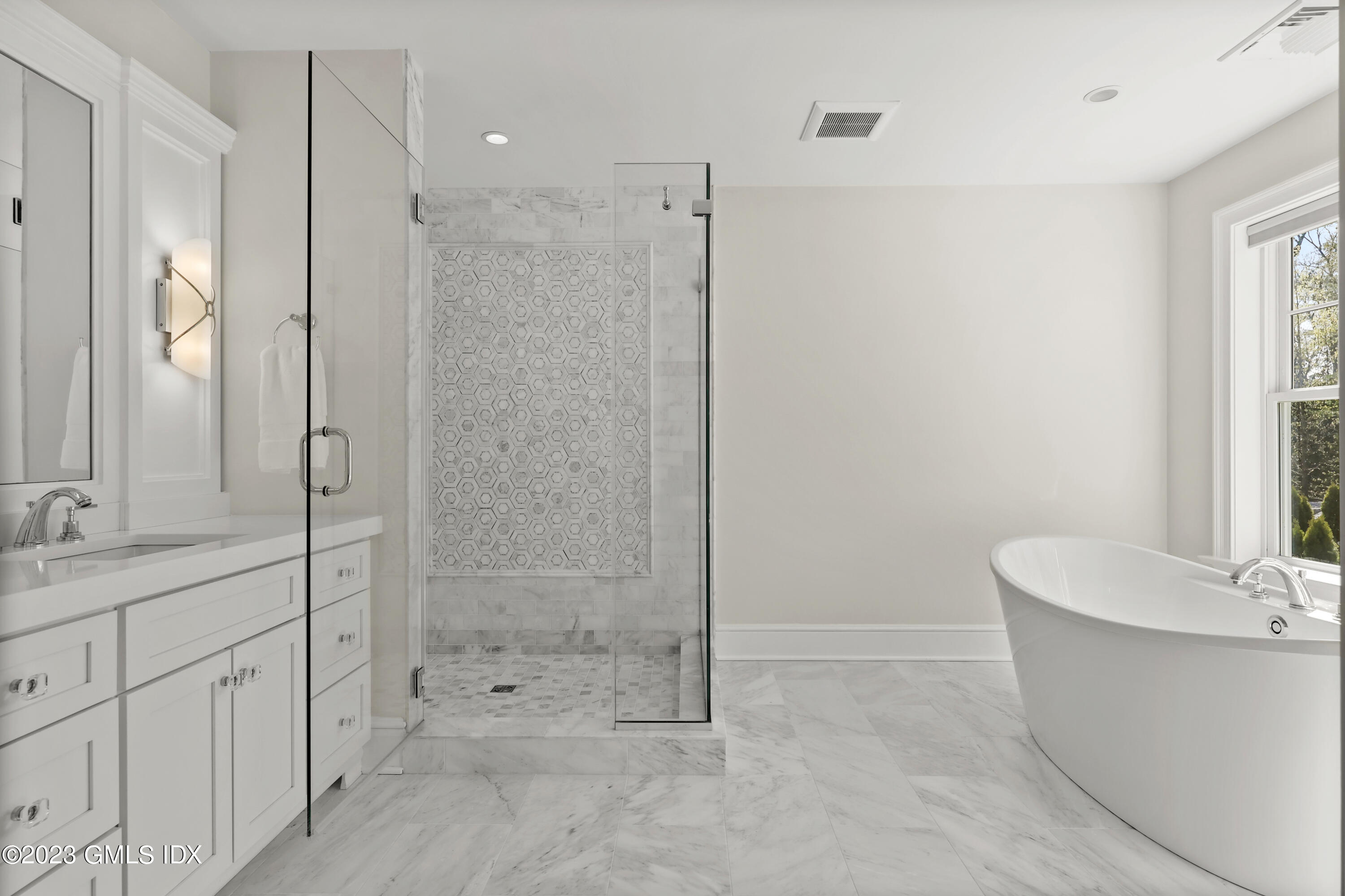 196 Valley Road Cos Cob, CT 06807 - Photo 11 of 18 a bathroom with a tub a sink and shower