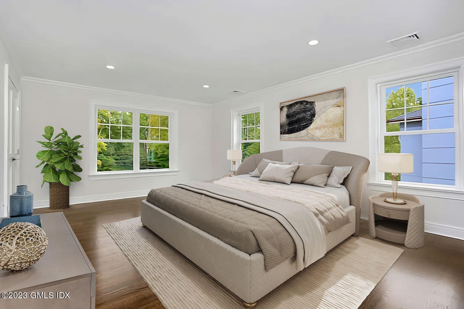 196 Valley Road Cos Cob, CT 06807 - Photo 12 of 18 a bedroom with a large bed and a window