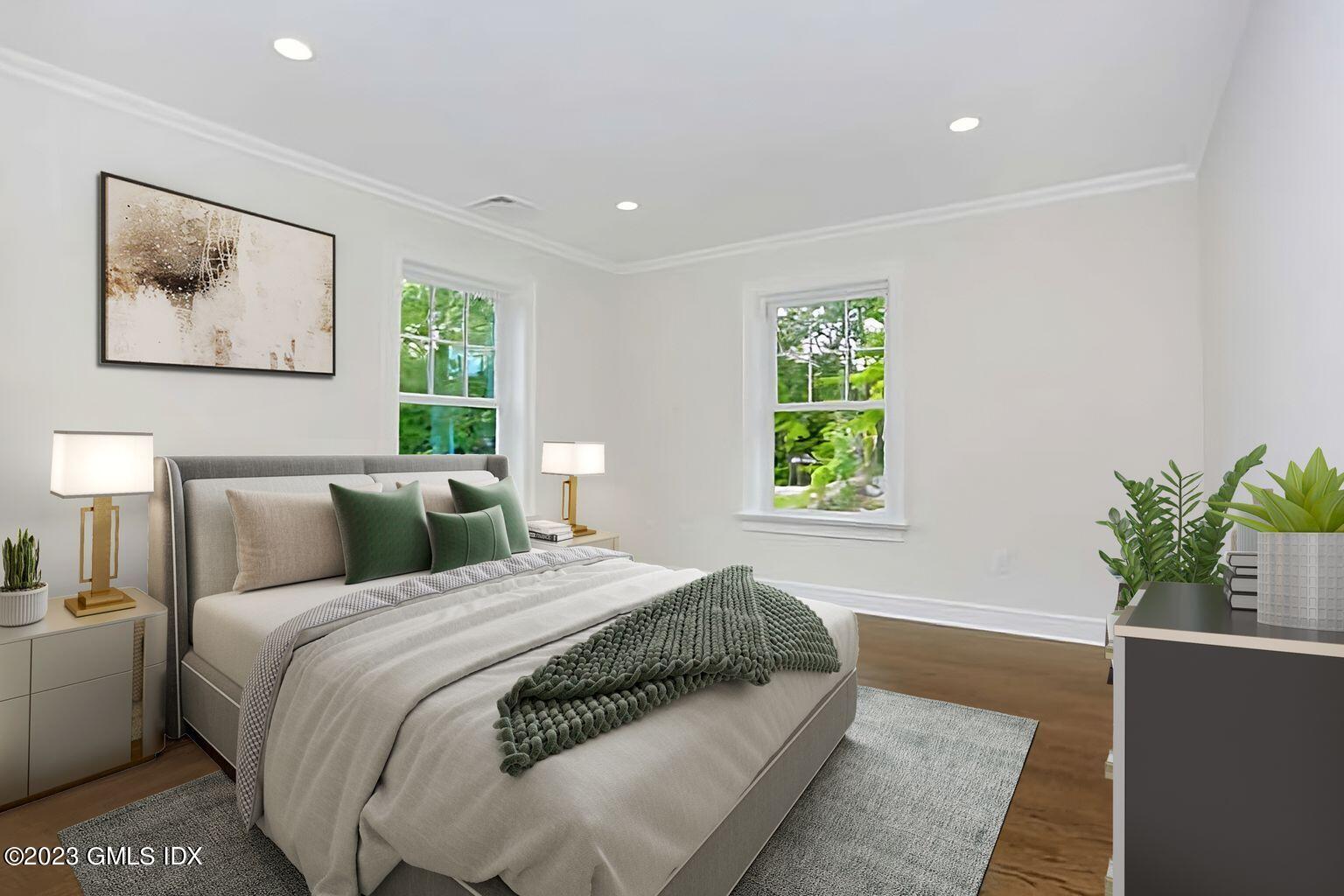 196 Valley Road Cos Cob, CT 06807 - Photo 13 of 18 a bedroom with a bed and a window