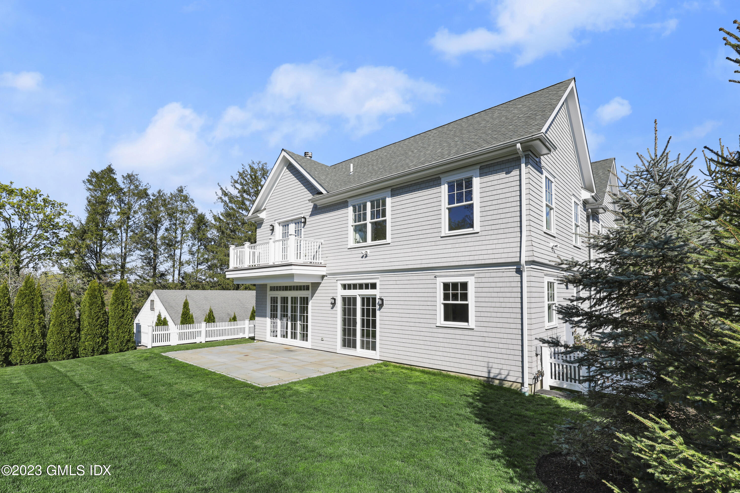 196 Valley Road Cos Cob, CT 06807 - Photo 18 of 18 a view of house with backyard and garden