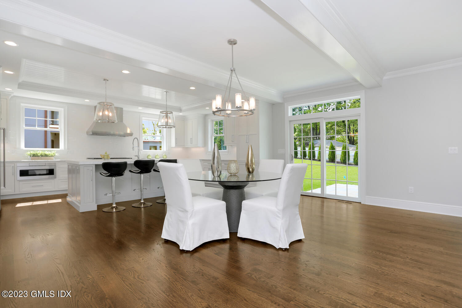 196 Valley Road Cos Cob, CT 06807 - Photo 4 of 18 a living room with fireplace furniture and a chandelier