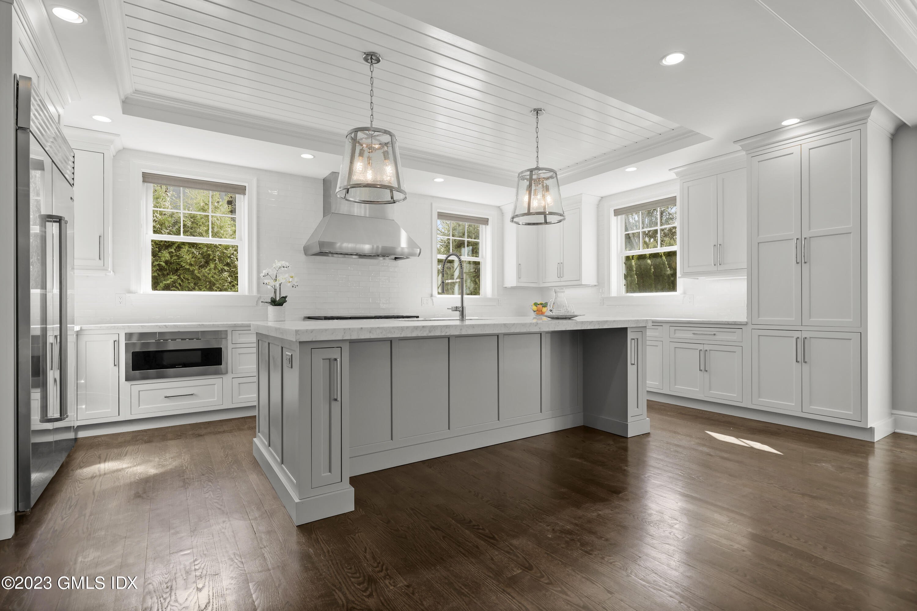 196 Valley Road Cos Cob, CT 06807 - Photo 5 of 18 a kitchen with stainless steel appliances granite countertop a stove a sink and a refrigerator