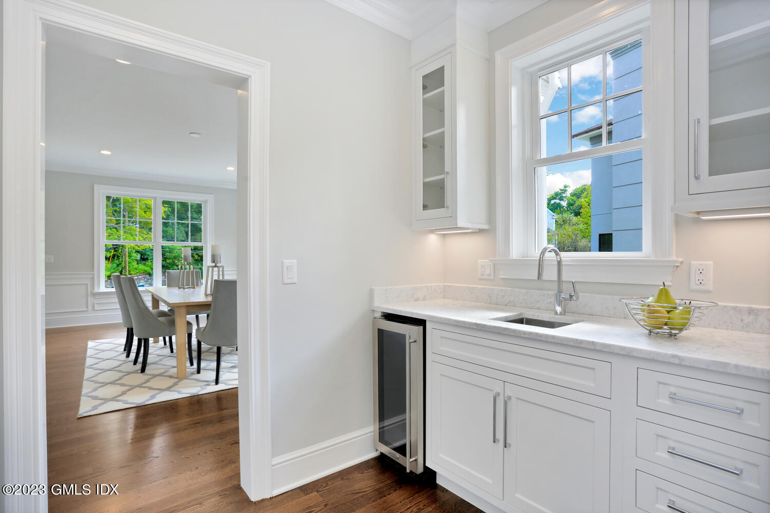 196 Valley Road Cos Cob, CT 06807 - Photo 9 of 18 a kitchen with a sink and a window