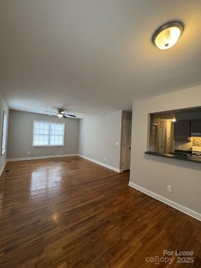 1007 Thomas Street Kannapolis, NC 28081 - Photo 3 of 3 a view of a livingroom with wooden floor