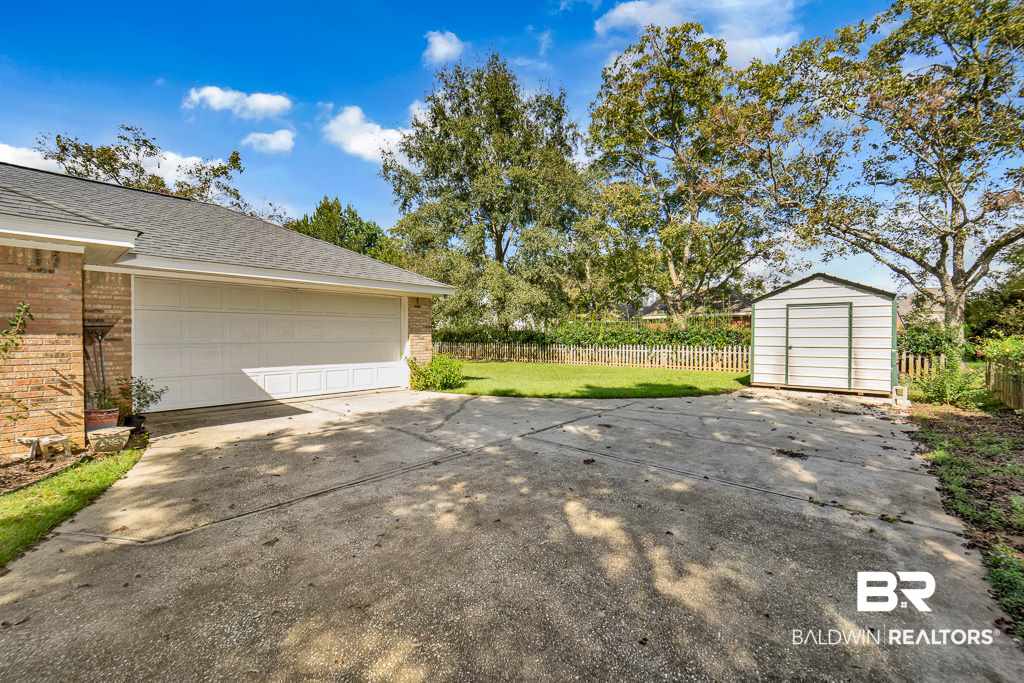 20094 Pecan Trace Fairhope, AL 36532 - Photo 25 of 28 Driveway with Shed