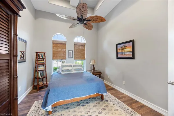 a view of a livingroom with furniture and a ceiling fan