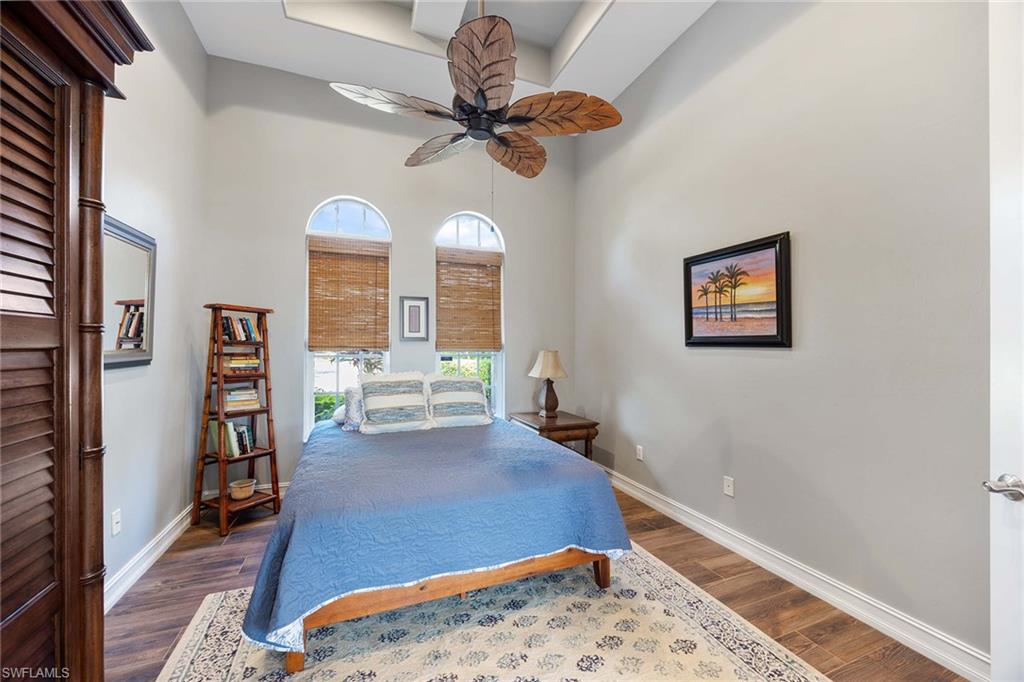 8902 Shenendoah Circle Naples, FL 34113 - Photo 15 of 28 a view of a livingroom with furniture and a ceiling fan