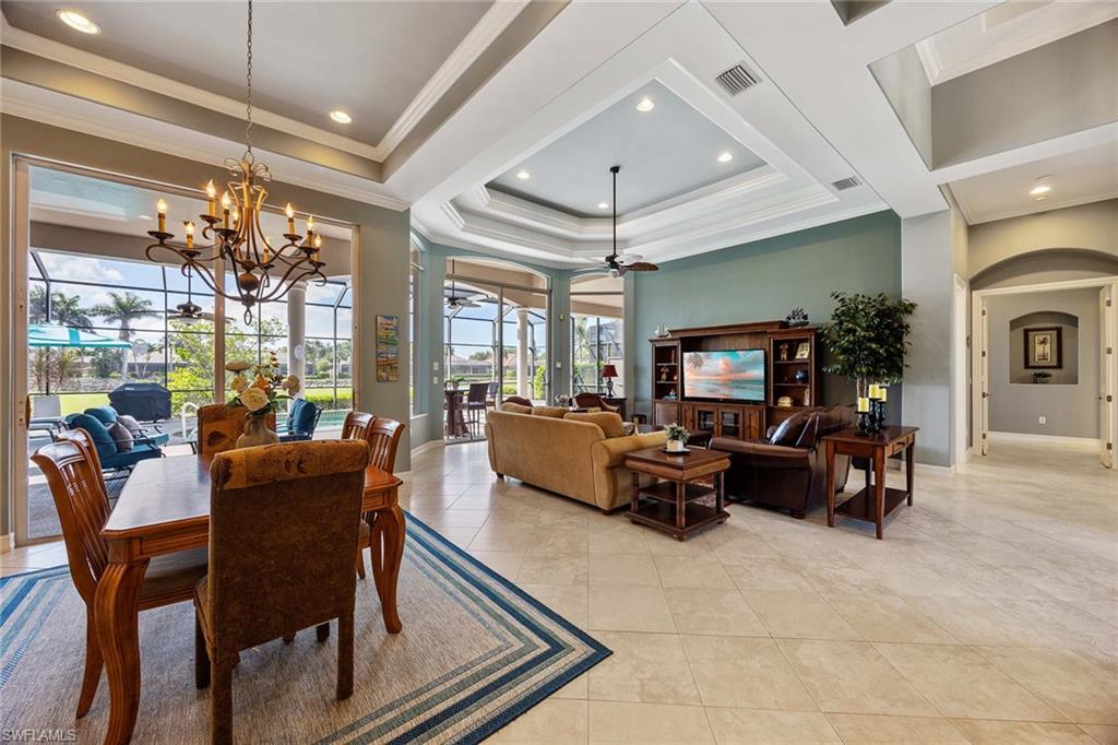 8902 Shenendoah Circle Naples, FL 34113 - Photo 6 of 28 a living room with furniture and a large window