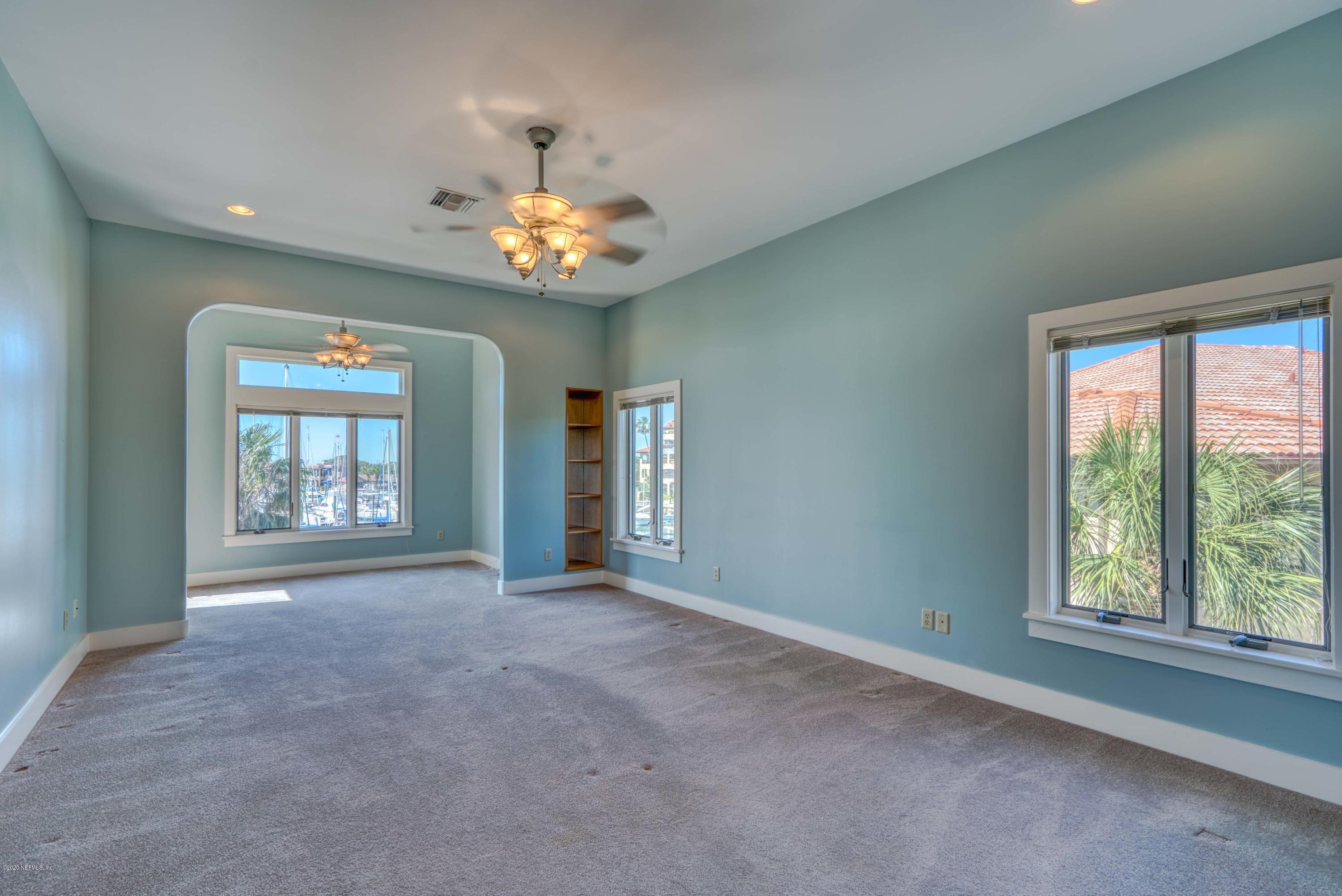 3701 Harbor Drive St. Augustine, FL 32084 - Photo 15 of 38 an empty room with a window and a ceiling fan