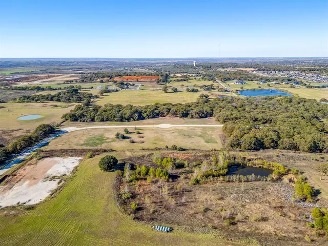 an aerial view of a house with a outdoor space