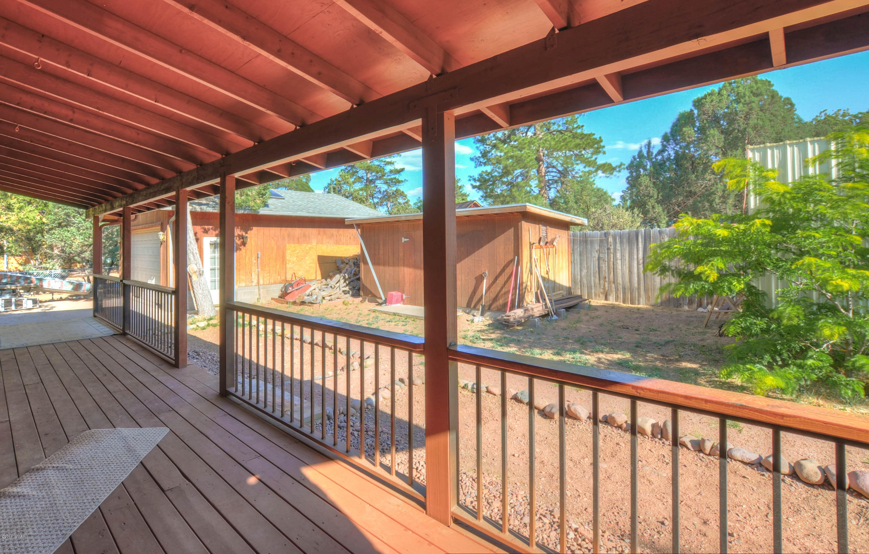 2151 Chevelon Road Overgaard, AZ 85933 - Photo 15 of 27 a view of porch with wooden floor in outdoor space