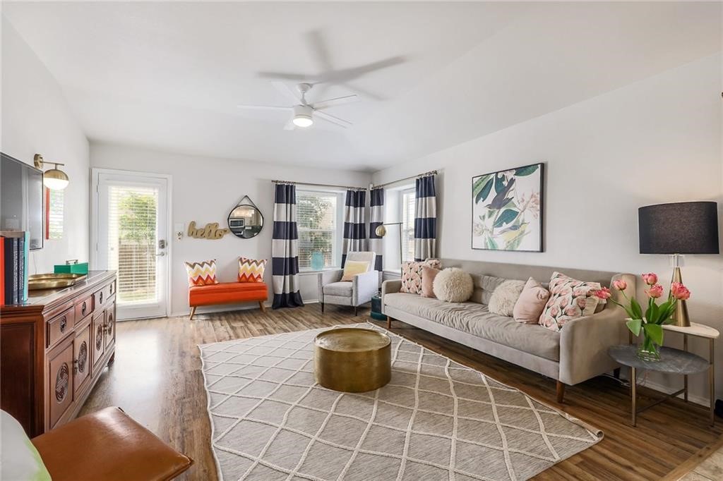 1908 Golden Arrow Avenue Cedar Park, TX 78613 - Photo 2 of 31 a living room with furniture and a rug