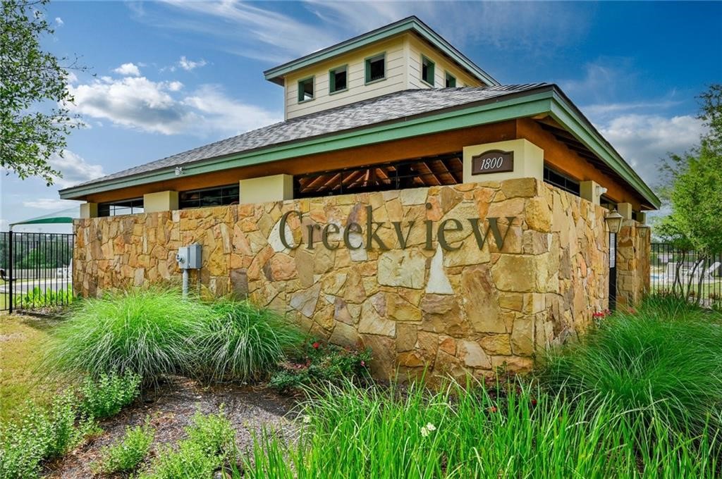 1908 Golden Arrow Avenue Cedar Park, TX 78613 - Photo 31 of 31 a front view of a house with a garden