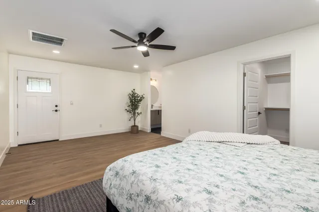 a view of an empty walk in closet