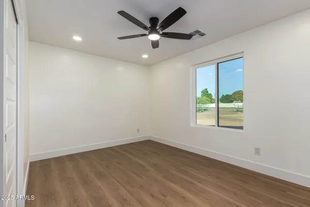 a view of swimming pool with seating space