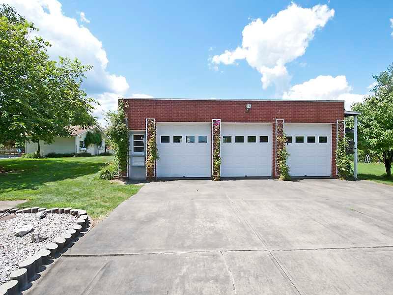 1543 Bakerstown Road Tarentum, PA 15084 - Photo 23 of 25 Full Bath. Three car detached garage. This leads to the greenhouse and potting area.