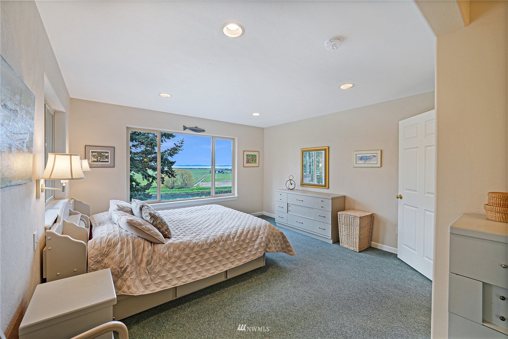 19695 Landing Road Mount Vernon, WA 98273 - Photo 16 of 40 a living room with furniture and a window