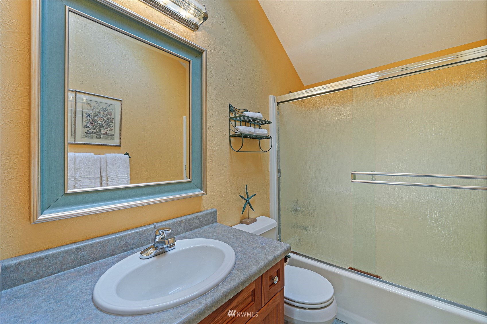 19695 Landing Road Mount Vernon, WA 98273 - Photo 25 of 40 a bathroom with a sink a toilet and shower