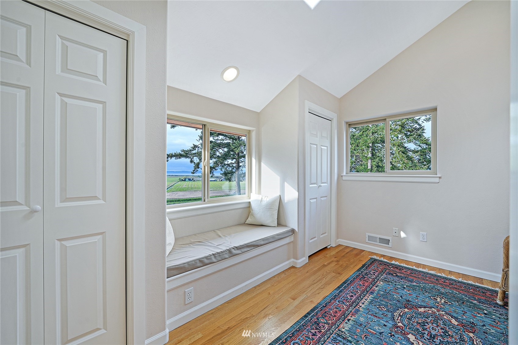 19695 Landing Road Mount Vernon, WA 98273 - Photo 26 of 40 a bedroom with a bed and a window