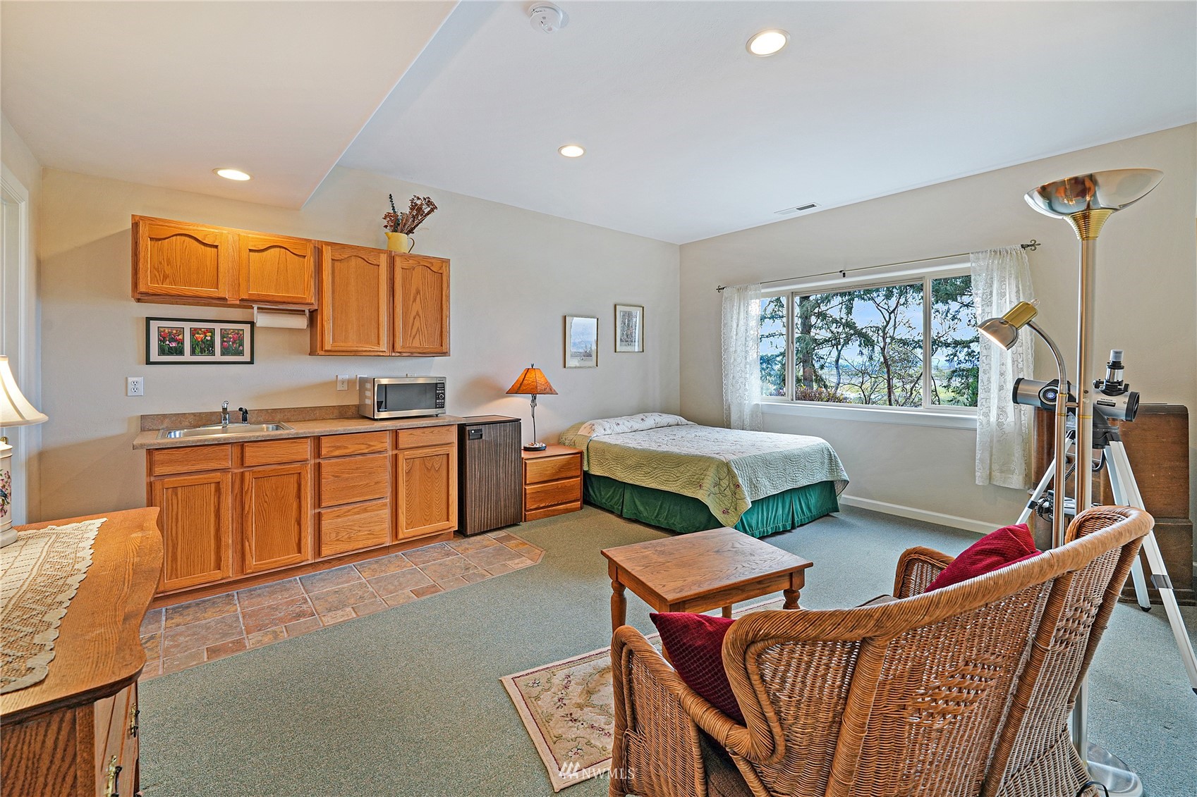 19695 Landing Road Mount Vernon, WA 98273 - Photo 30 of 40 a bedroom with furniture and a window