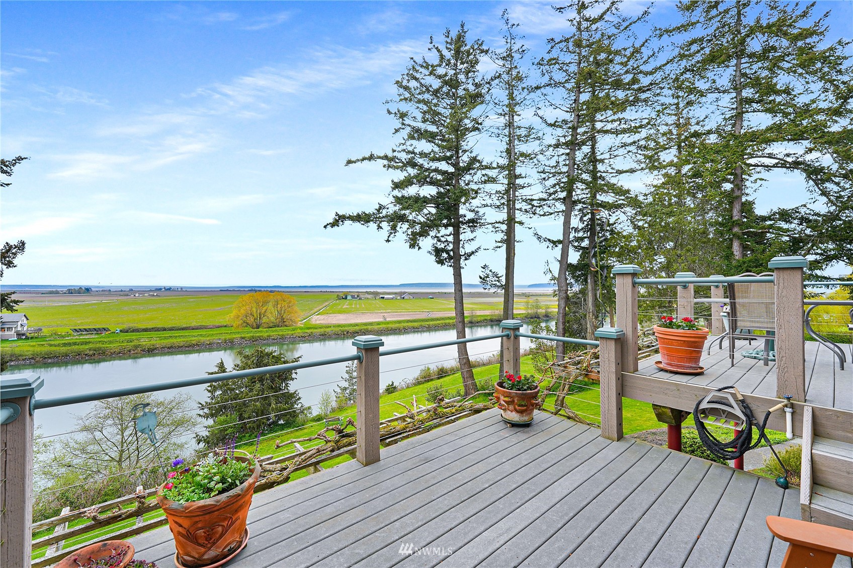 19695 Landing Road Mount Vernon, WA 98273 - Photo 5 of 40 a view of a deck with wooden floor and seating space
