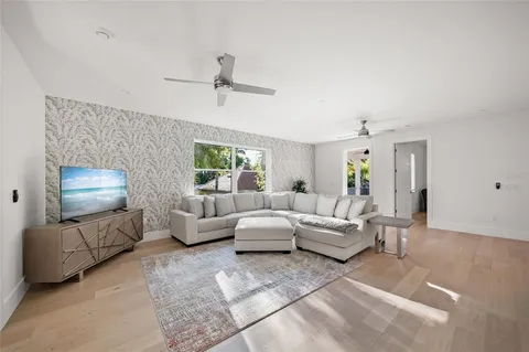 a view of a balcony with furniture