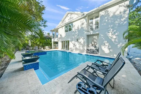 a view of an empty room and glass door