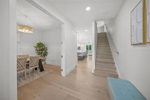 a view of a dining room with furniture and window