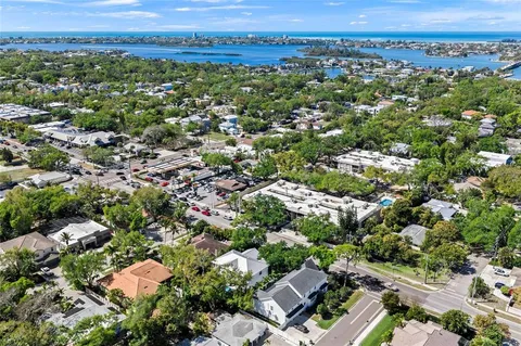 an aerial view of a house with a garden