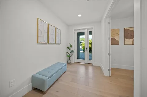 a kitchen with a stove a sink and a refrigerator