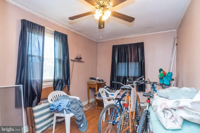 a very nice looking dining room with furniture