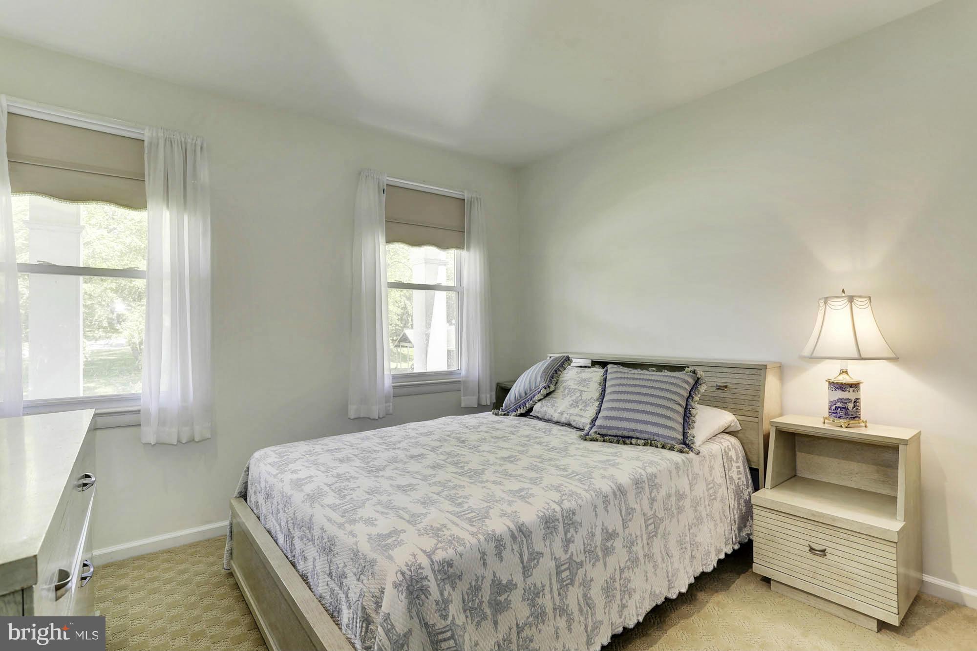 6501 Darwin Road Laurel, MD 20707 - Photo 14 of 30 a bedroom with a bed and a window