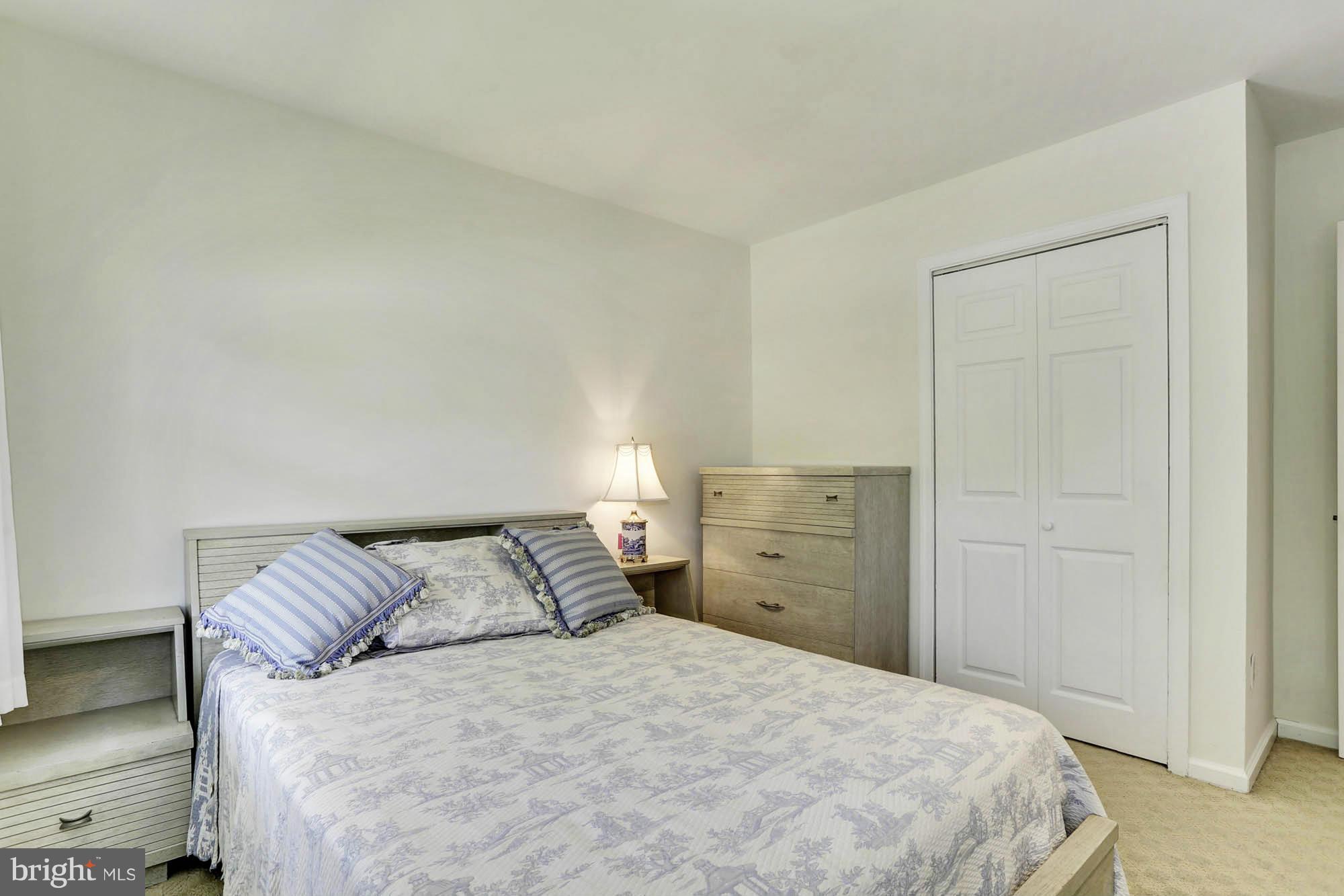 6501 Darwin Road Laurel, MD 20707 - Photo 15 of 30 a bedroom with a bed and a closet
