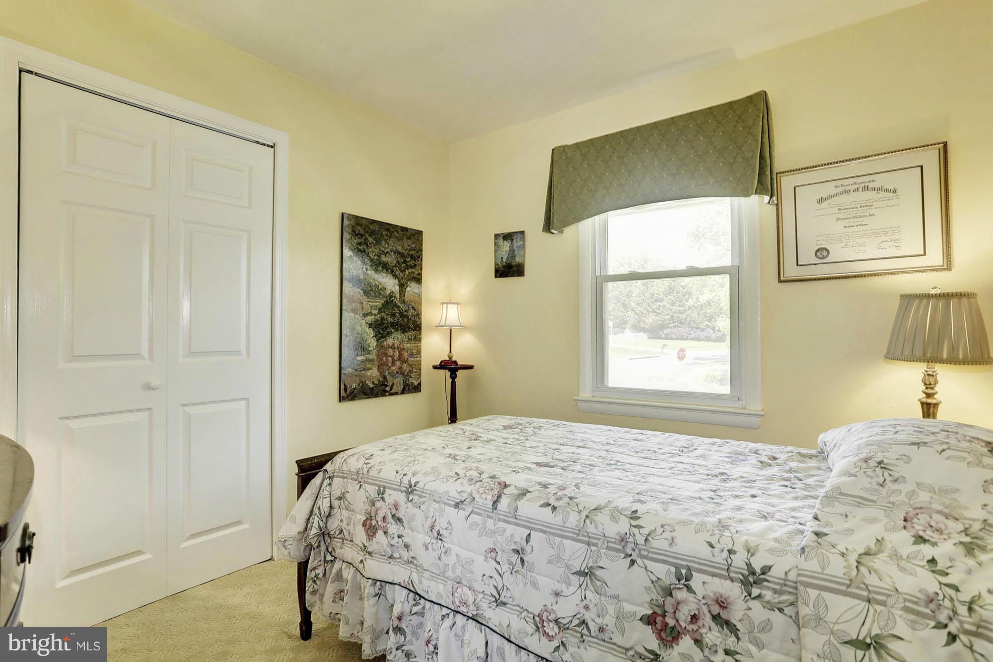6501 Darwin Road Laurel, MD 20707 - Photo 16 of 30 a bedroom with a bed and a window