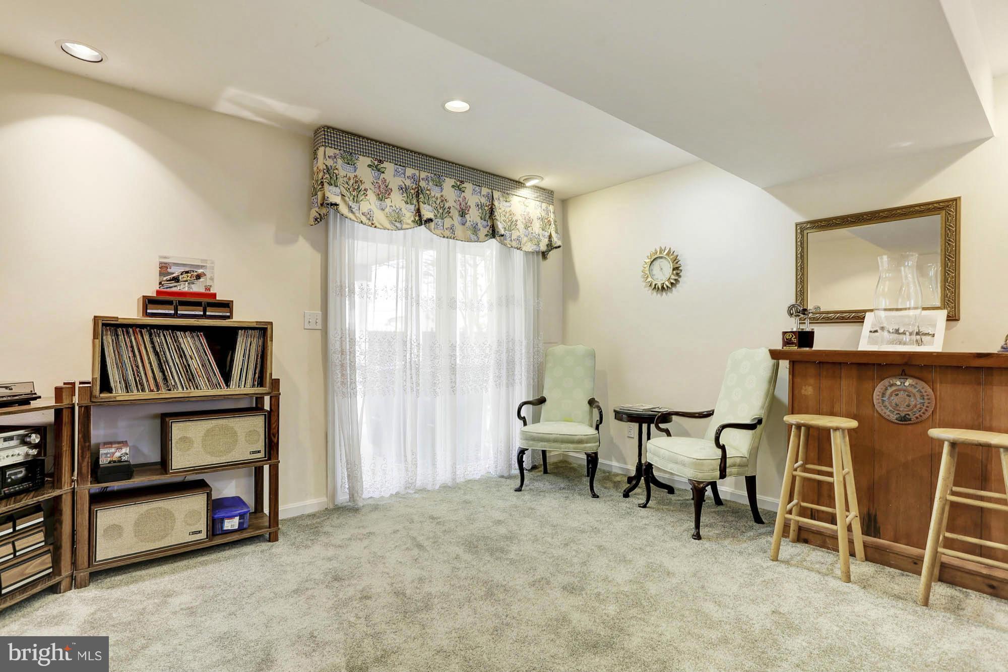 6501 Darwin Road Laurel, MD 20707 - Photo 19 of 30 a view of a livingroom with furniture and staircase