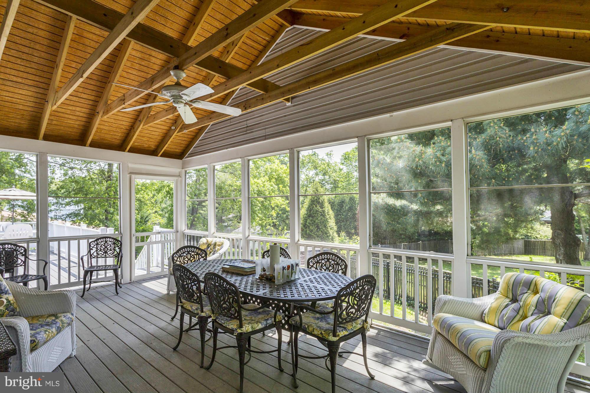 6501 Darwin Road Laurel, MD 20707 - Photo 25 of 30 a view of a dining room with furniture window and outside view