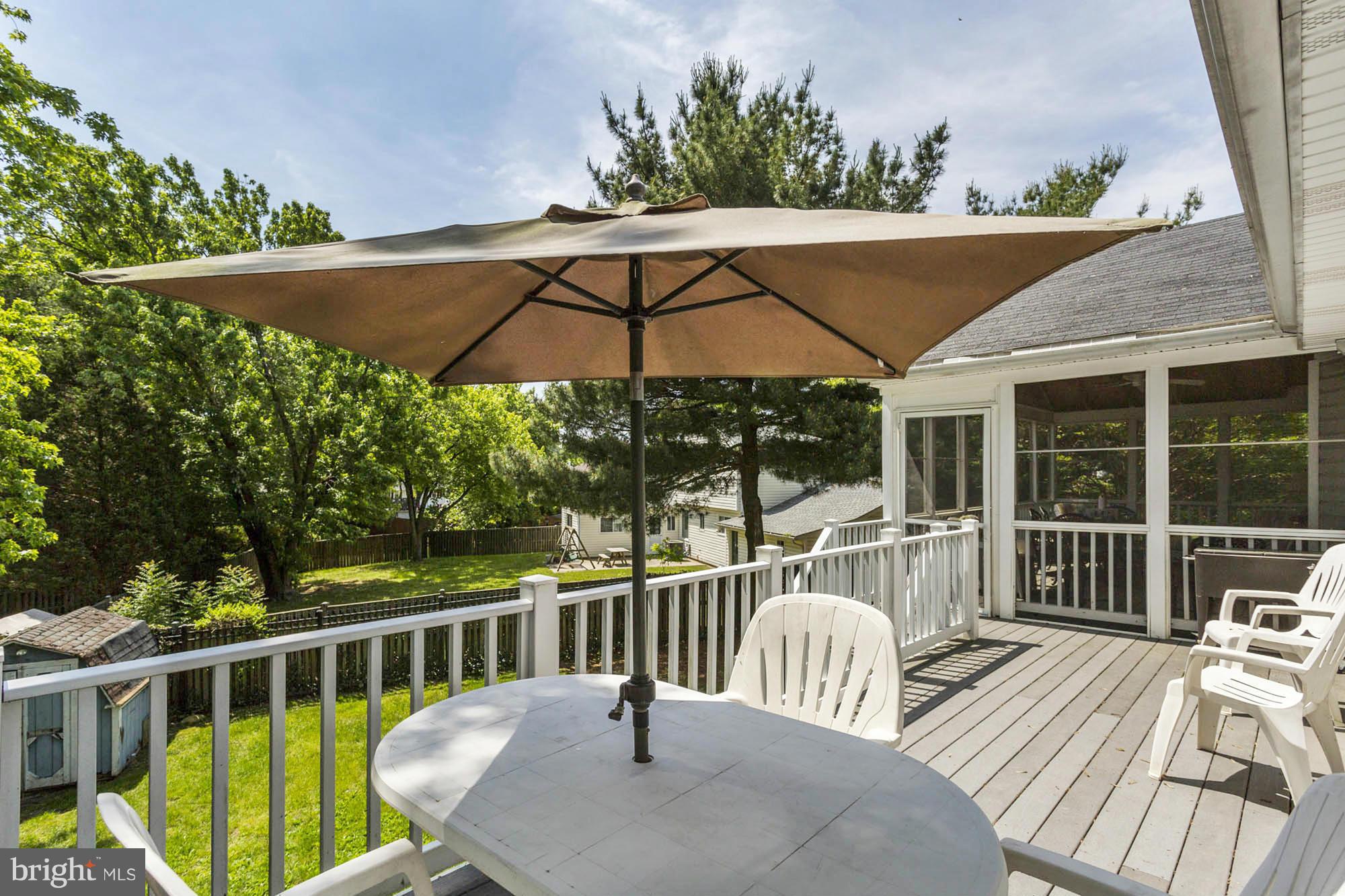 6501 Darwin Road Laurel, MD 20707 - Photo 29 of 30 a view of a two chairs and table in the deck
